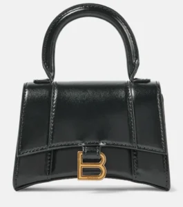 Balenciaga minibag Hourglass in pelle colore nero con tracolla su Mytheresa per Nice to be Woman