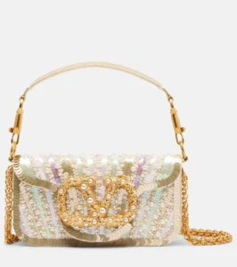 Valentino Garavani borsa a spalla Locò Small in raso con paillettes su Mytheresa per la selezione Luxury Edit di Nice to be Woman